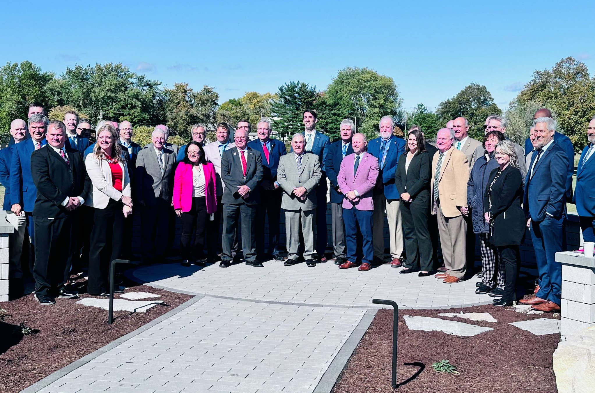 COUNTRY Financial, the Illinois Farm Bureau, the Illinois State Historical Society and other members of the community gather for the dedication of a new historical marker