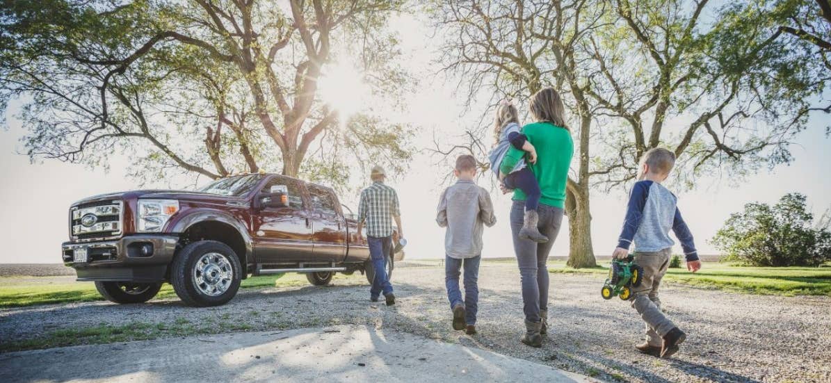 family walking to vehicle